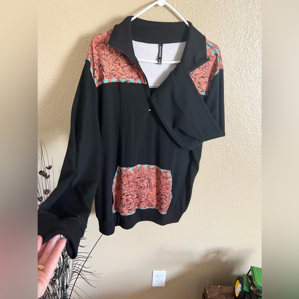 Crazy Train 3/4 zip pullover with Tooled pattern. Pouch in front for hands